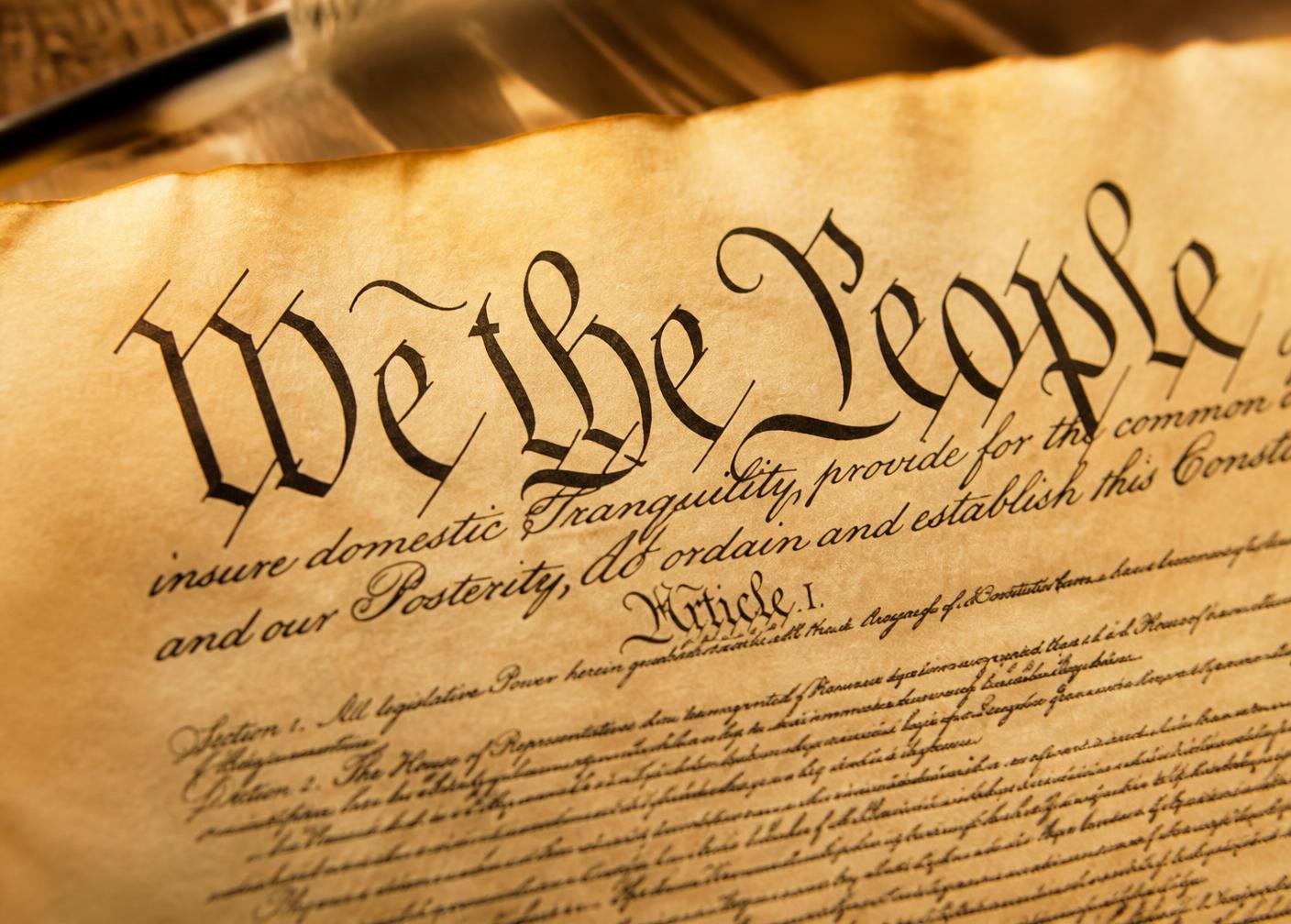 Close-up of the U.S. Constitution opening with 'We the People'